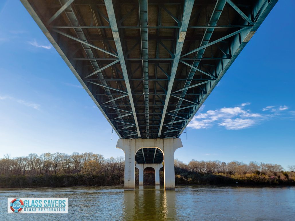 27 restored commercial glass panels showing crystal clear results after Glass Savers scratch removal