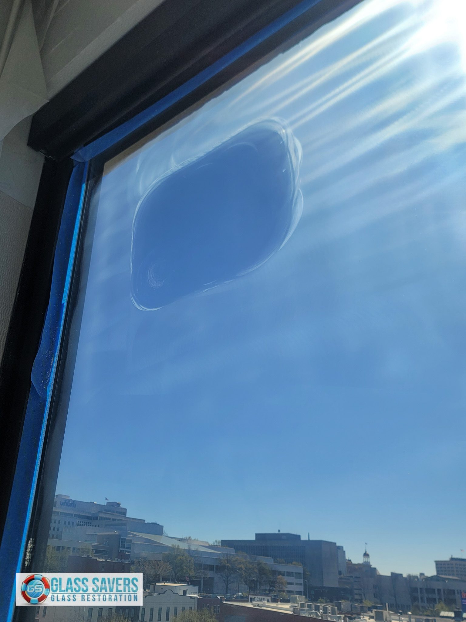 Restored crystal clear glass panels after Glass Savers scratch removal in Chattanooga