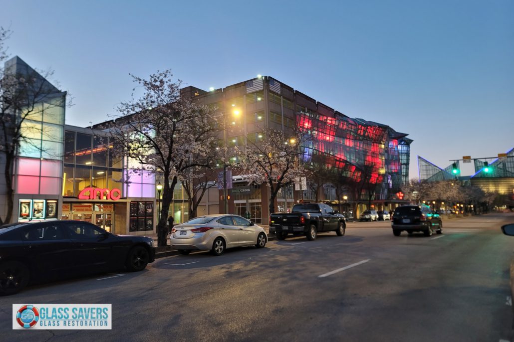 Full floor of commercial glass panels being restored while office remains fully operational
